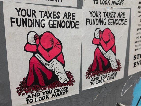 Poster saying your taxes are funding genocide and you choose to look away?