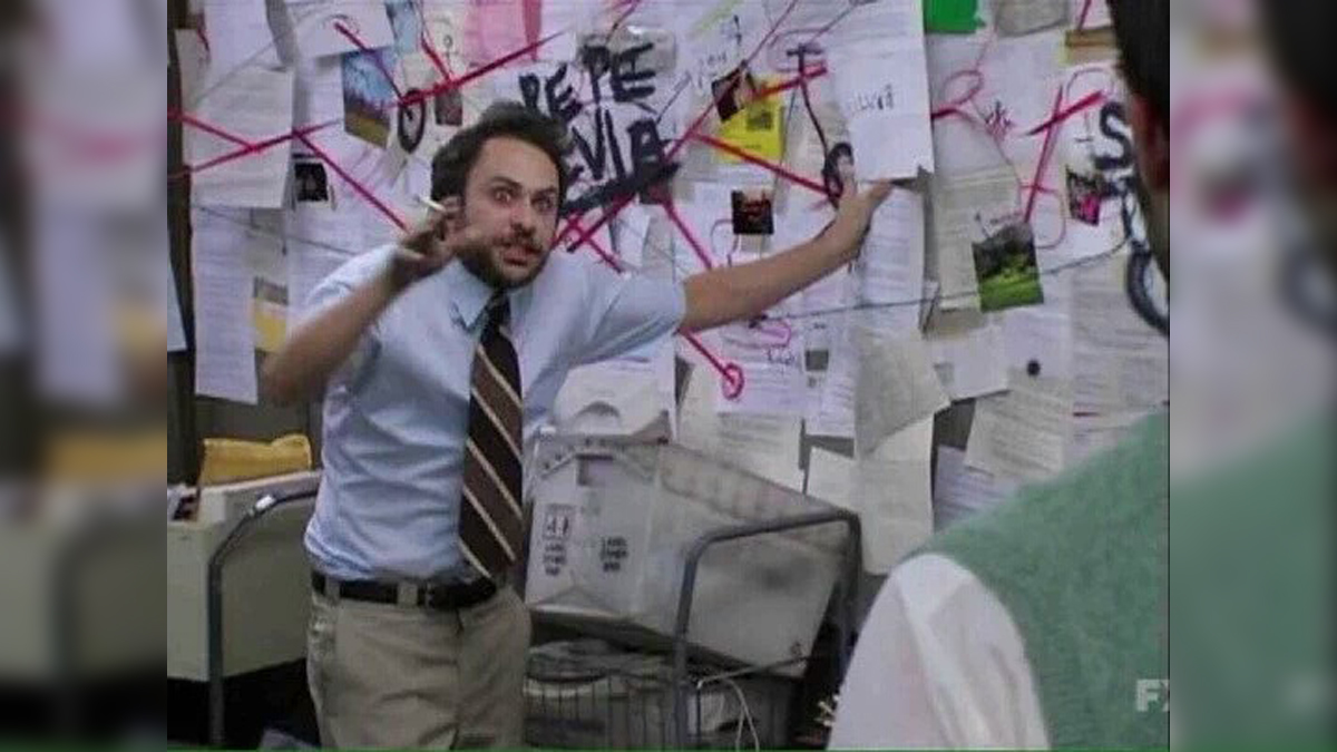 charlie from it's always sunny pointing at a bespoke wall of conspiracy materials connected by red yarn, while smoking a cigarette and looking absolutely unhinged